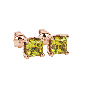 Close-up, princess canary yellow gemstone earrings, rose gold lotus setting.