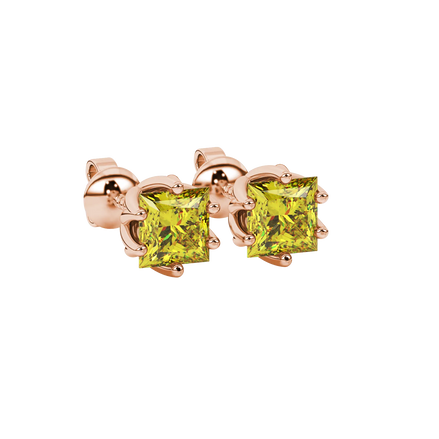 Close-up, princess canary yellow gemstone earrings, rose gold scalloped setting.