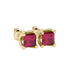 Close-up, princess raspberry red gemstone, yellow gold tulip earrings.