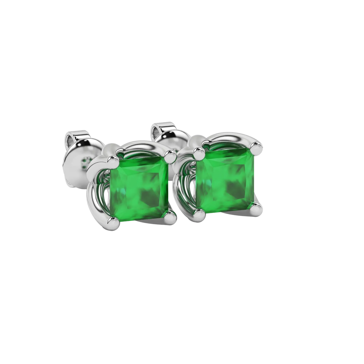 Close-up emerald green gemstone, white gold tulip setting.