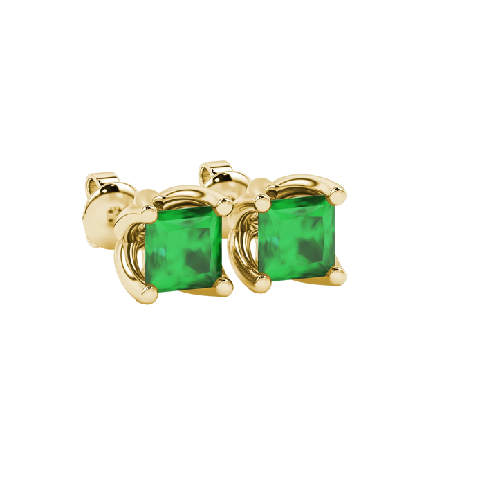 Close-up, princess emerald green gemstone, yellow gold tulip earrings.