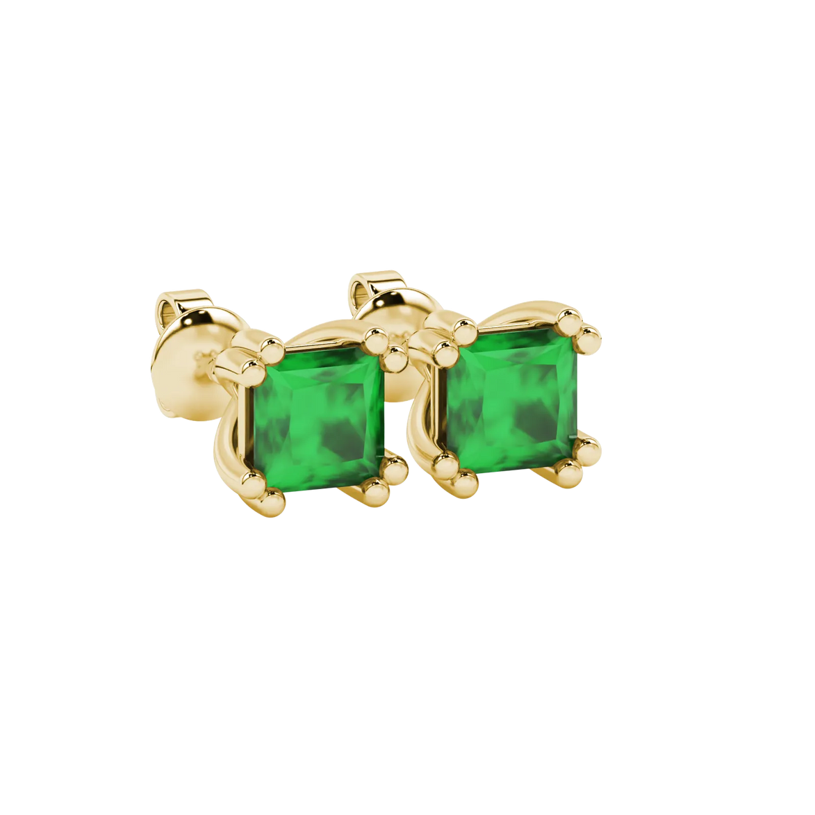 Close-up, princess emerald green gemstone, yellow gold vintage earrings.