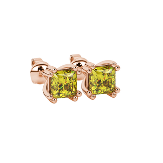 Close-up, princess canary yellow gemstone earrings, rose gold vintage setting