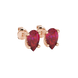 Close-up, pear shape raspberry red gemstone earrings, rose gold four-prong setting.