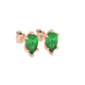 Close-up, pear shape emerald green gemstone earrings, rose gold six-prong setting.