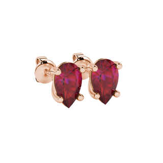 Close-up, pear shape raspberry red gemstone earrings, rose gold classic basket.