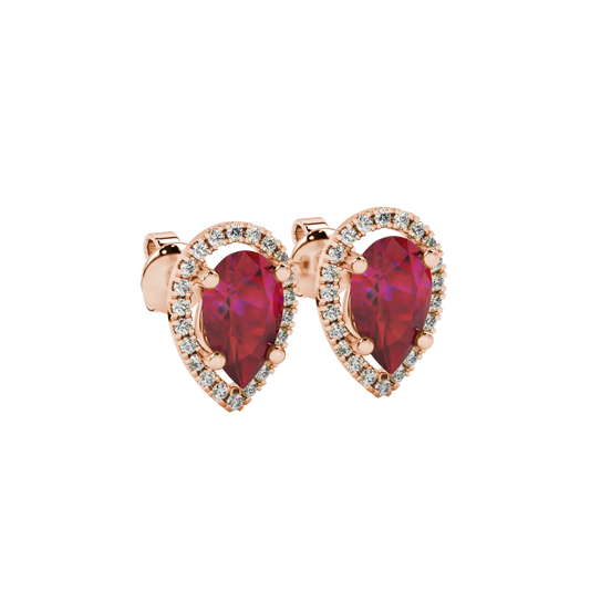 Close-up, pear shape raspberry red gemstone earrings, rose gold french pavé halo.