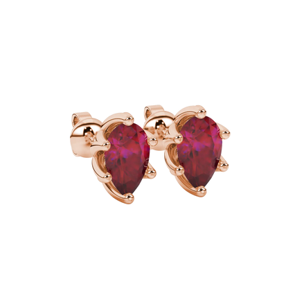 Close-up, pear shape raspberry red gemstone earrings, rose gold scalloped setting.