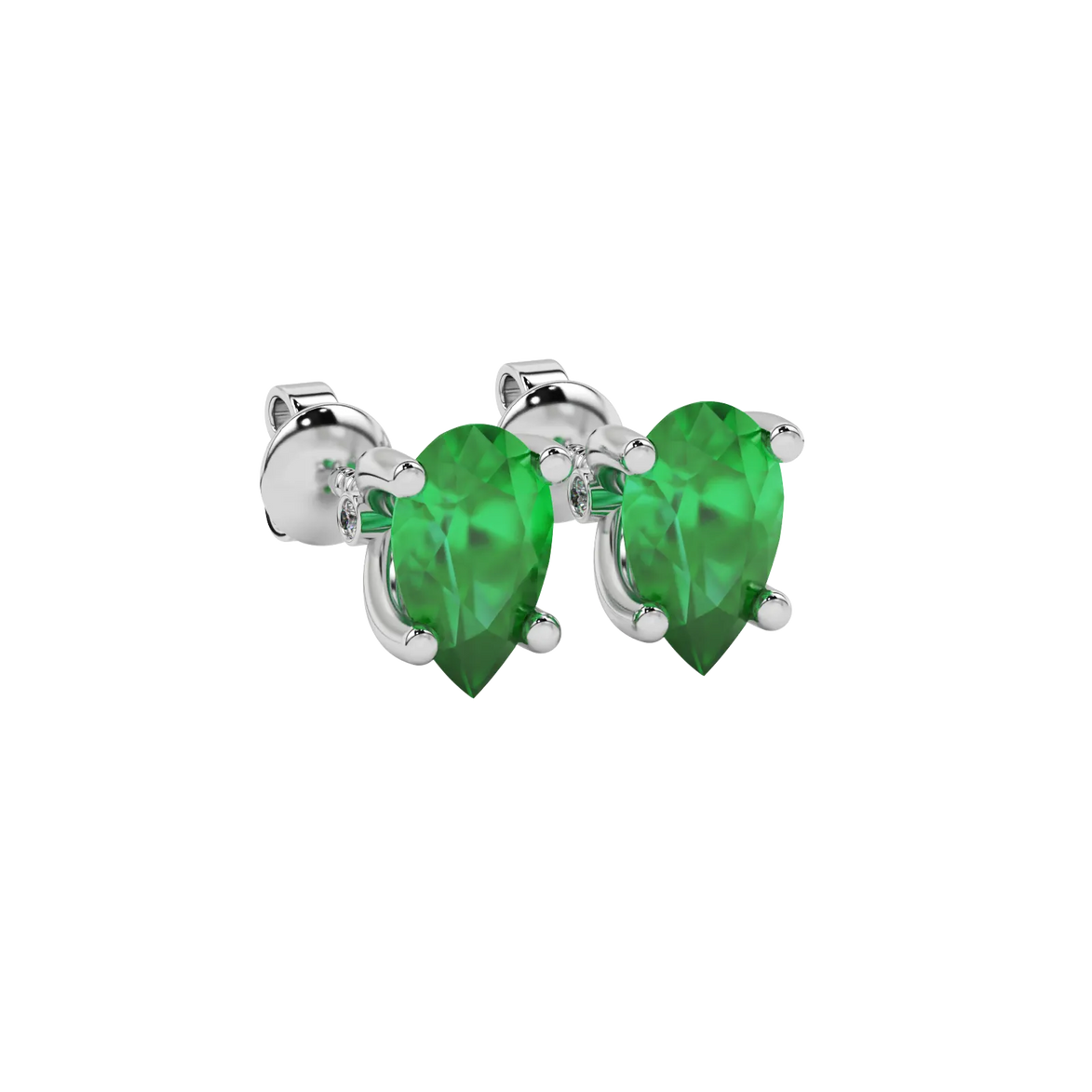 Close-up emerald green gemstone earing, white gold surprise diamond setting.