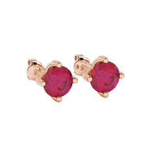 close-up shot of round raspberry red gemstone earrings with a rose gold four-prong design.