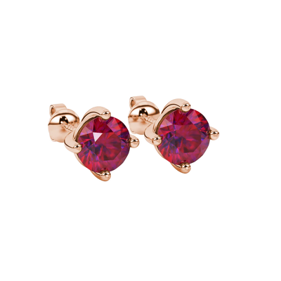 close-up shot of round raspberry red gemstone earrings with a rose gold classic basket design.