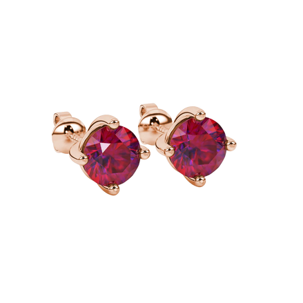 close-up shot of round raspberry red gemstone earrings with a rose gold classic basket design.