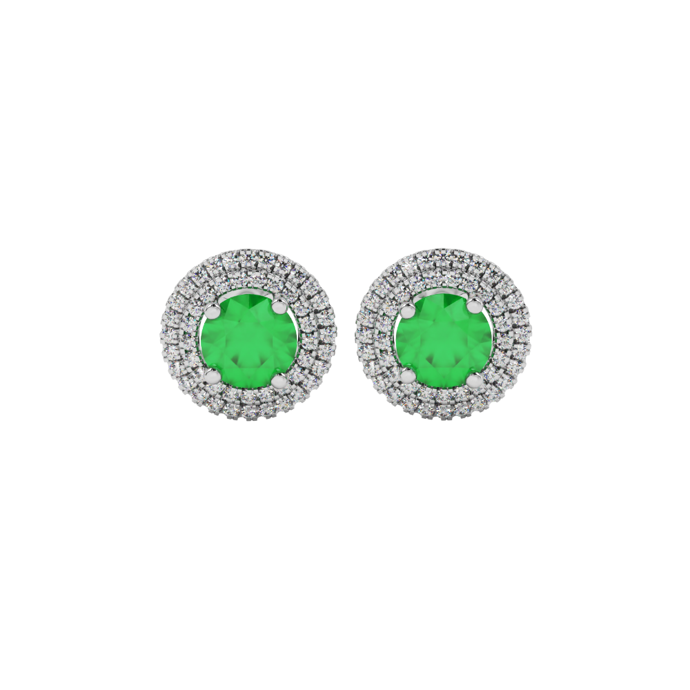 Close-up of a round emerald green gemstone enclosed in a white gold diamond falling edge halo setting.