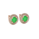 Round-cut emerald green gemstone stud earrings in a rose gold falling edge halo diamond setting.
