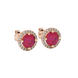 Close-up shot of round raspberry red gemstone stud earrings with a diamond French pavé halo in rose gold.