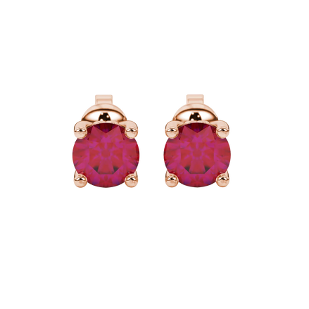 Round-cut raspberry red gemstone stud earrings in a rose gold lotus basket setting.