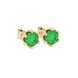 Close-up details of a round-cut emerald green gemstone in a yellow gold scalloped six-prong setting.