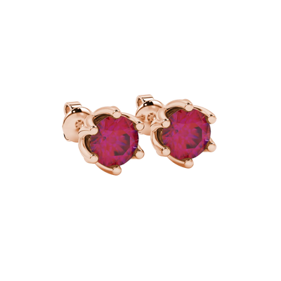 close-up shot of round raspberry red gemstone earrings with a rose gold scalloped six-prong design.