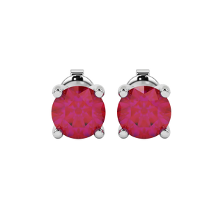 Round-cut raspberry red gemstone stud earrings in a white gold surprise diamond setting.