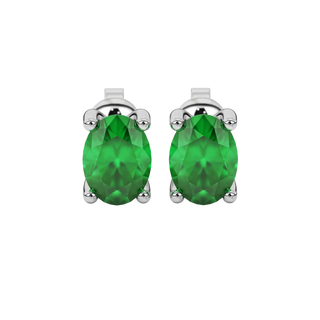 Oval cut emerald green gemstone earrings, white gold four prong setting.