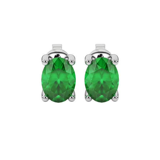 Oval cut emerald green gemstone earrings, white gold four prong setting.