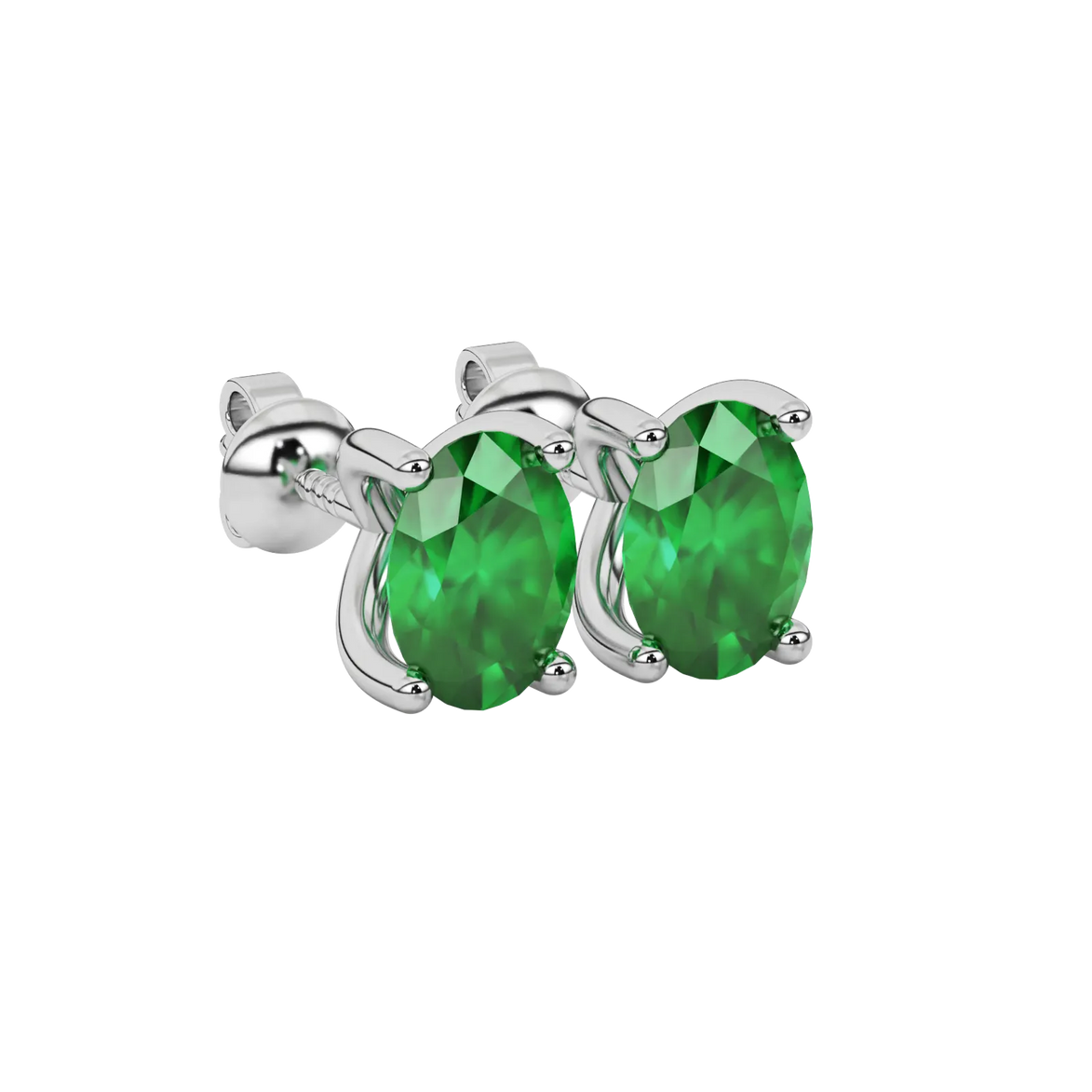 Close-up oval cut emerald green gemstone earing, white gold four prong setting