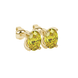 Close-up, oval cut canary yellow gemstone, yellow gold four prong earrings.