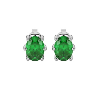 Oval cut emerald green gemstone earrings, white gold six prong setting.