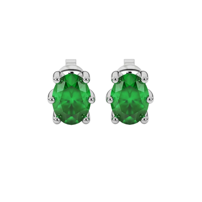 Oval cut emerald green gemstone earrings, white gold six prong setting.