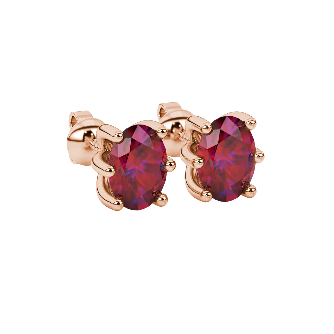 Close-up, oval cut raspberry red gemstone earrings, rose gold six prong setting.