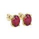 Close-up, oval cut raspberry red gemstone, yellow gold classic basket earrings.