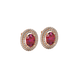 Close-up, oval cut raspberry red gemstone earrings, rose gold double halo.