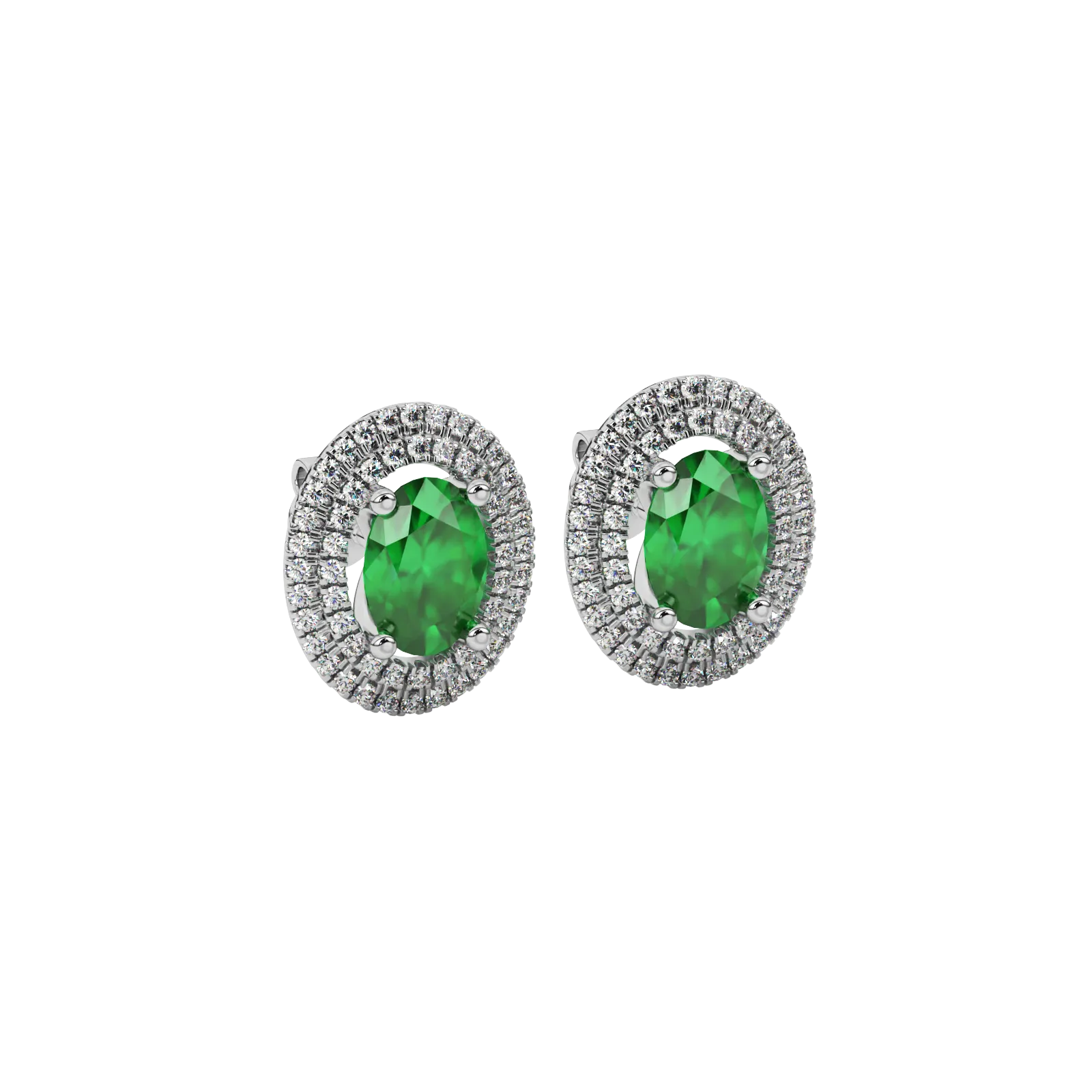 Close-up emerald green gemstone earing, white gold falling edge halo.