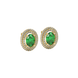 Close-up, oval cut emerald green gemstone, yellow gold falling edge halo earrings.