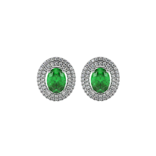 Oval cut emerald green gemstone earrings, white gold falling edge halo setting.