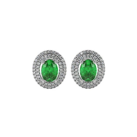 Oval cut emerald green gemstone earrings, white gold falling edge halo setting.