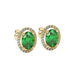 Close-up, oval cut emerald green gemstone, yellow gold french pavé halo earrings.