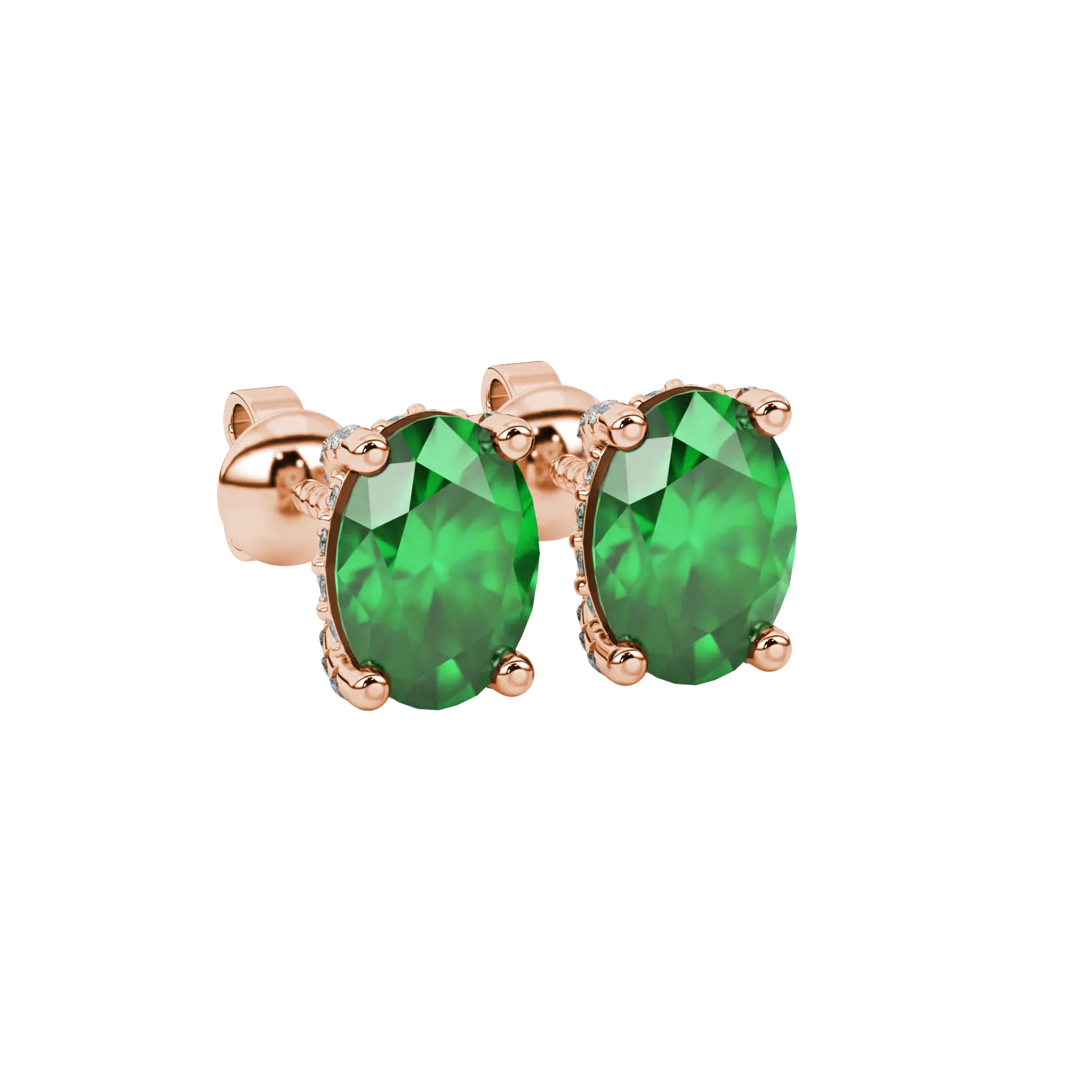 Close-up, oval cut emerald green gemstone earrings, rose gold pavé basket.