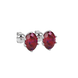 Close-up oval cut raspberry red gemstone, white gold scalloped six prong setting.