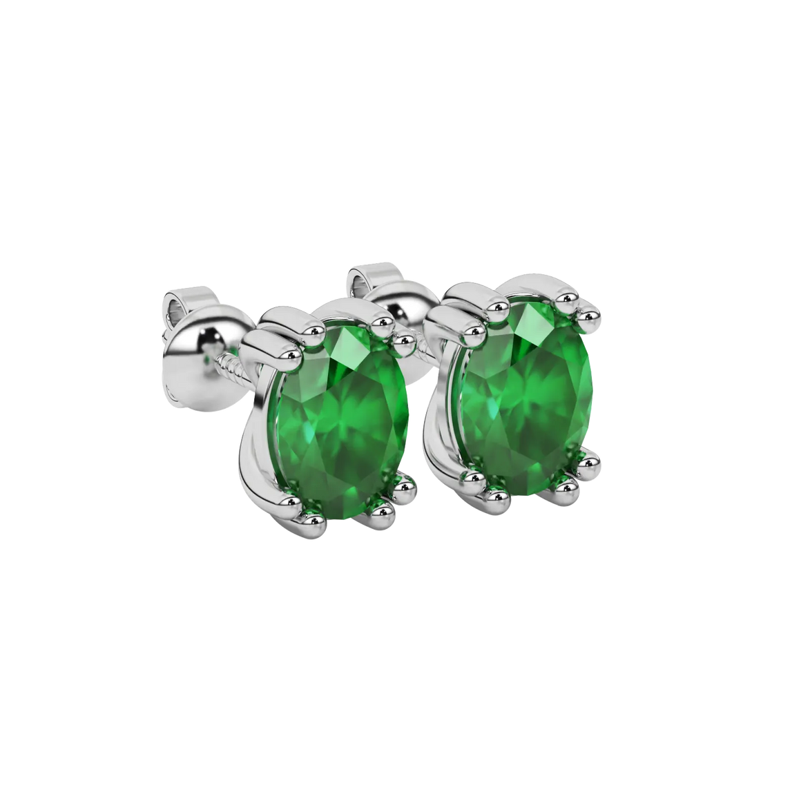 Close-up oval cut emerald green gemstone earing, white gold vintage basket.