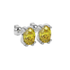 Close-up oval cut canary yellow gemstone earing, white gold vintage basket.