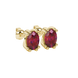 Close-up, oval cut raspberry red gemstone, yellow gold vintage basket earrings.