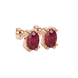 Close-up, oval cut raspberry red gemstone earrings, rose gold vintage basket.
