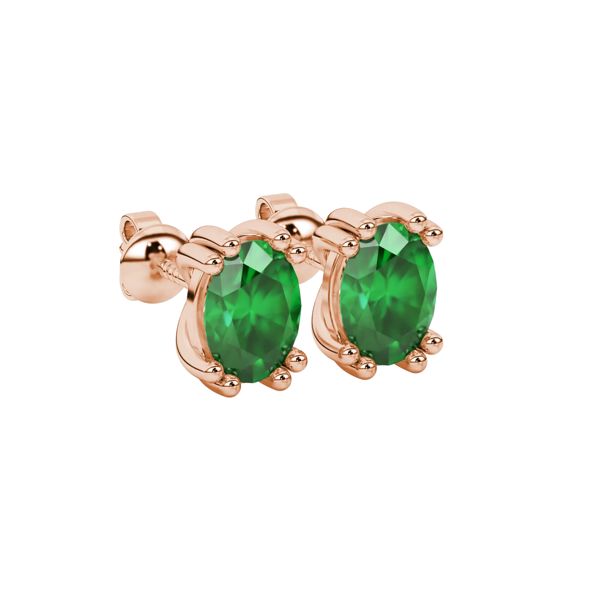 Close-up, oval cut emerald green gemstone earrings, rose gold vintage basket.