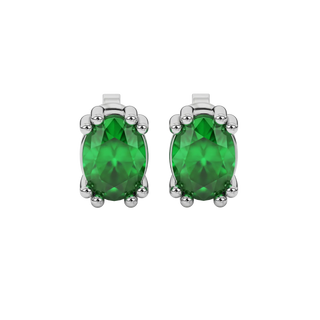 Oval cut emerald green gemstone earrings, white gold vintage basket setting.