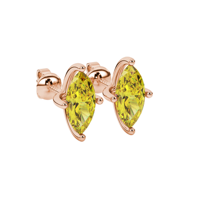 Close-up, marquise cut canary yellow gemstone earrings, rose gold four prong.