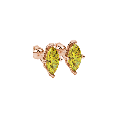 Close-up, marquise cut canary yellow gemstone earrings, rose gold lotus basket.