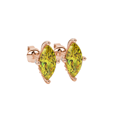 Close-up, marquise cut canary yellow gemstone earrings, rose gold pavé basket.