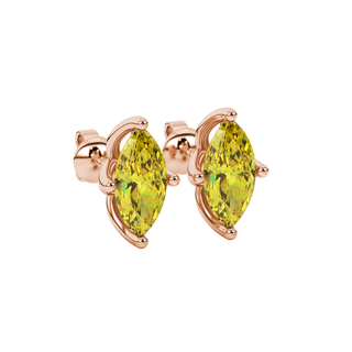Close-up, marquise cut canary yellow gemstone earrings, rose gold tulip basket.