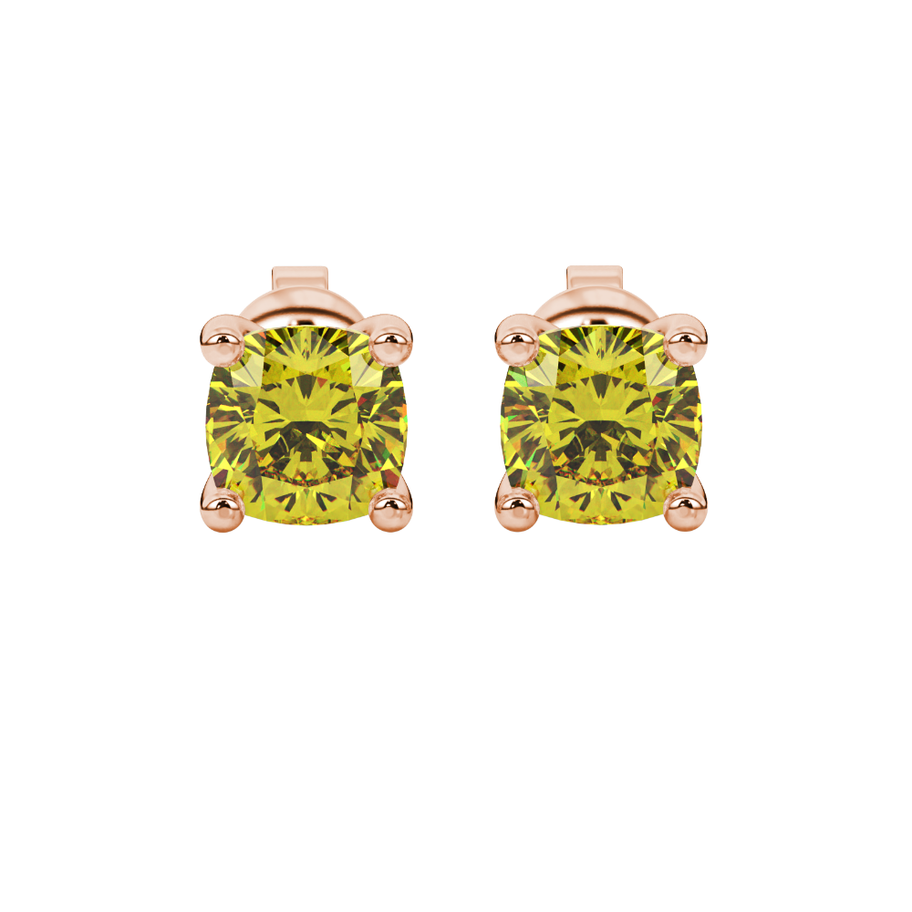 Yellow cushion cut gemstone solitaire stud earrings in gold featuring a refined four-prong basket setting